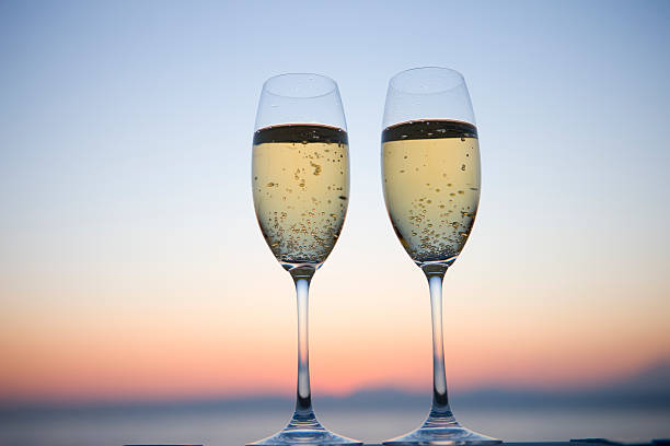istock Two glasses of Champagne in twilight 618042316