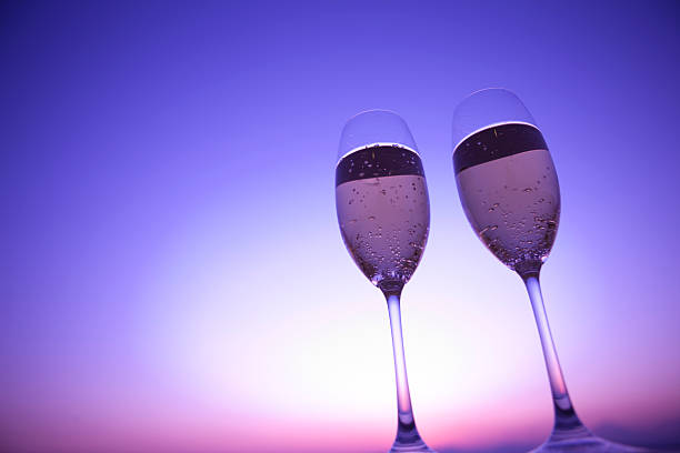 istock Two glasses of Champagne in twilight 618042420
