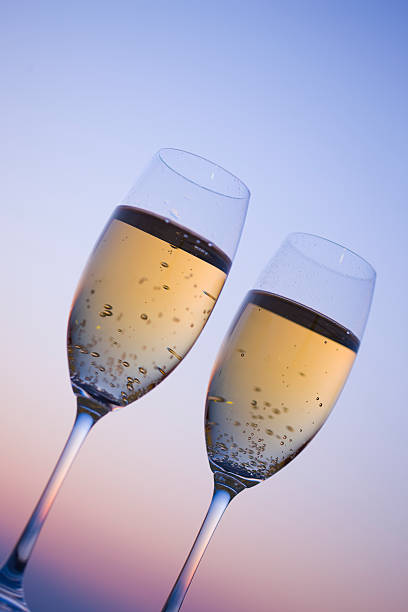 istock Two glasses of Champagne in twilight 618042610