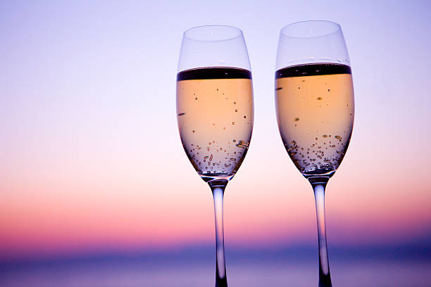 istock Two glasses of Champagne in twilight 618042704