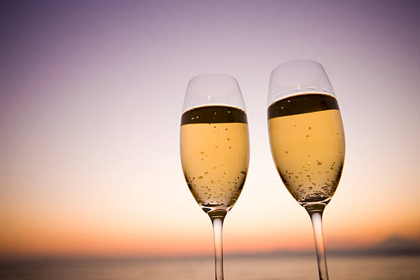 istock Two glasses of Champagne in twilight 618042786
