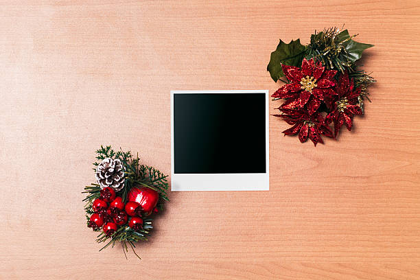 istock Christmas arrangement with blank photo frame for card 618043122