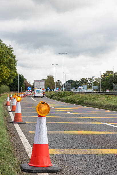 istock Authentic UK Motorway Roadworks Warning Traffic Cones 618043426