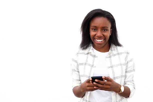 istock African woman having fun using smartphone 618045198