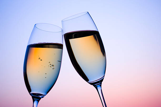istock Two glass of white wine in dusk 618052266