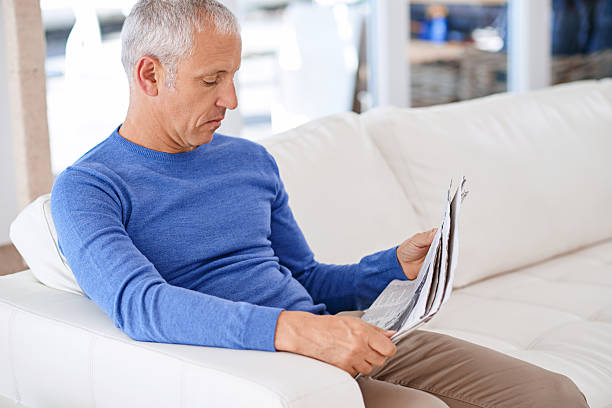 istock Taking time to catch up on the news 618066090