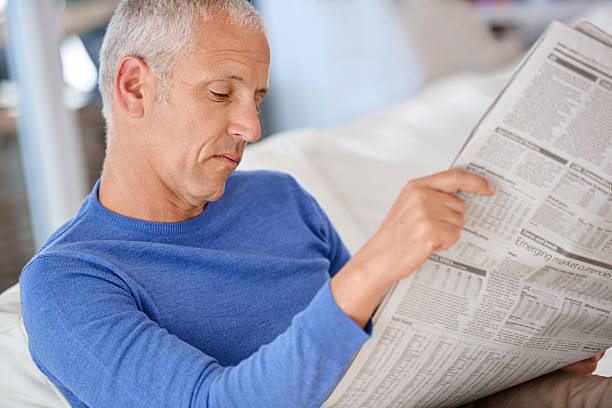 istock Catching up on all the news 618066112