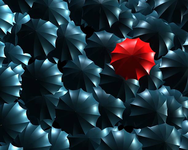 istock Standing out from the crowd concept with umbrellas 618067244
