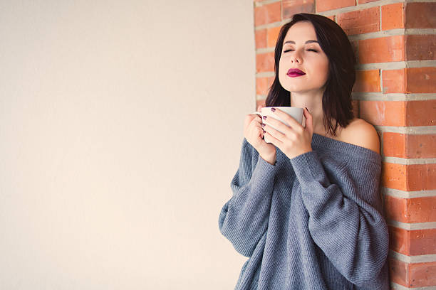 istock woman with of coffee or tea 618068844