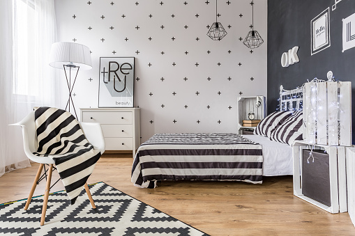 Shot of a creative black and white bedroom