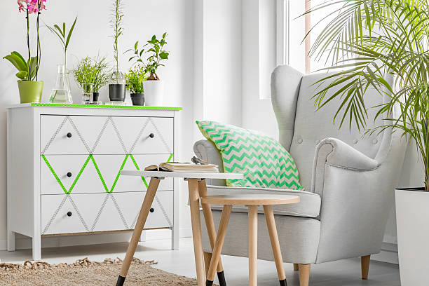 istock Room corner with armchair with flower pot 618069536