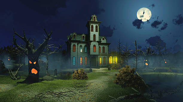 istock Scary mansion and creepy trees at night 618070938