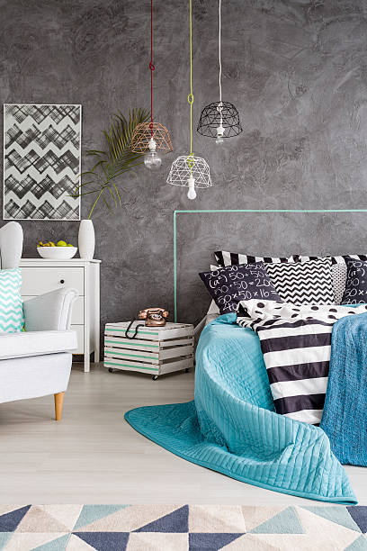 istock Stylish bedroom with unique lighting on the ceiling 618071142