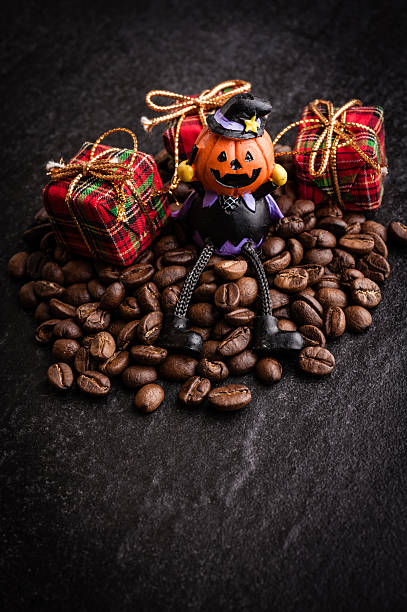 istock Red gift box and halloween toy decorate 618178274
