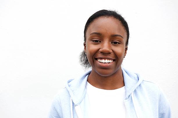 istock Happy african woman smiling 618179348