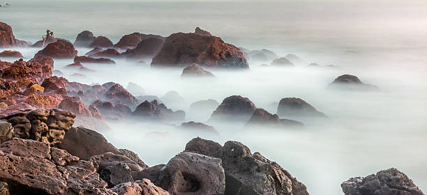 The beautiful waters of the Atlantic ocean with its rocky coastline near the City of Dakar in Senegal