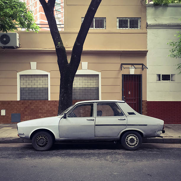 istock Old car parked in the street 618184292