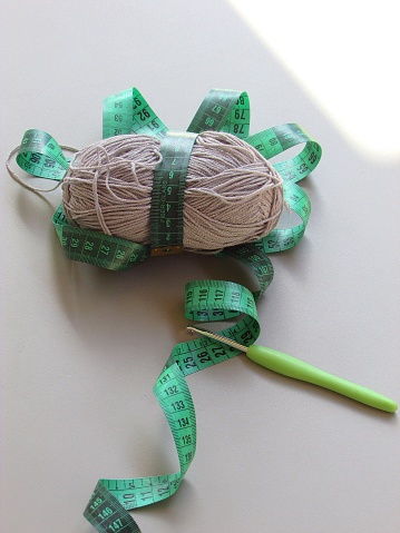 knitting and sewing essentials, in shades of green.