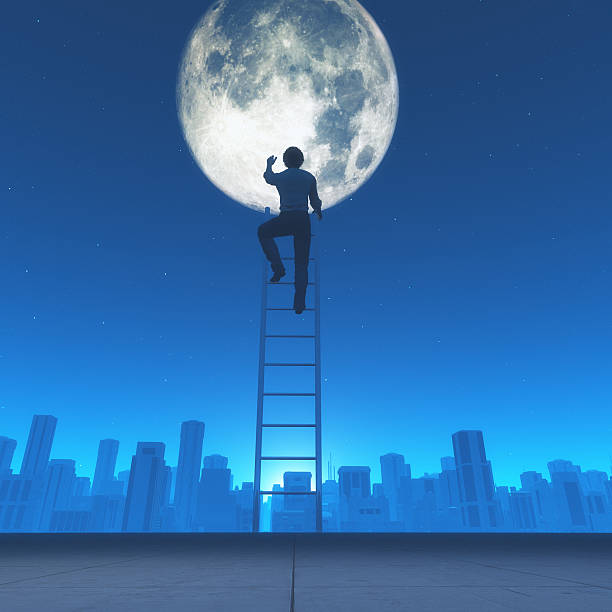 istock Man climb a ladder to the moon i 618187008