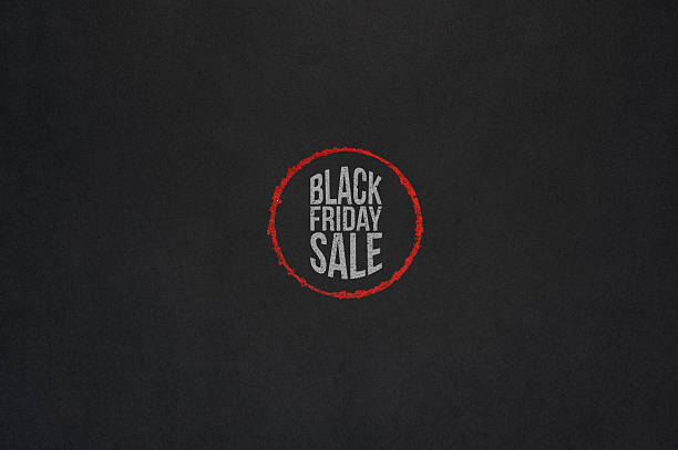 istock Black Friday Sale Text in red Circle on dark Paper 618187074