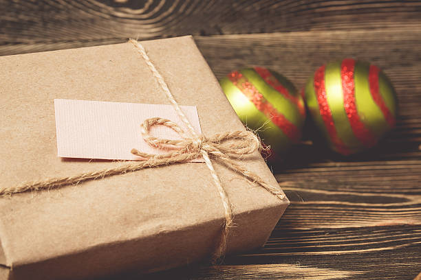 istock Christmas gifts box presents on brown 618187248