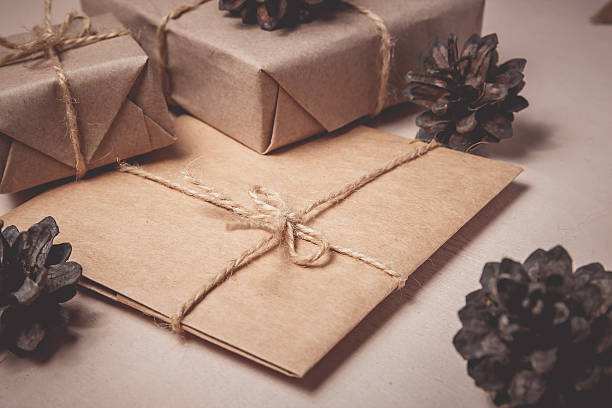 istock Christmas gifts box presents on brown 618188828
