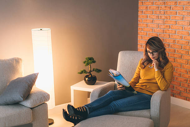 istock Woman relaxing at home 618189252