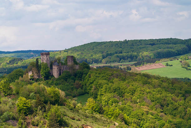 Old castle in northern Luxembourg surrounded by forest.\n[url=http://api.istockphoto.com/search/lightbox/11148362#a9048f0][img]https://dl.dropbox.com/u/37296299/LBs/Nature.jpg[/img][/url]