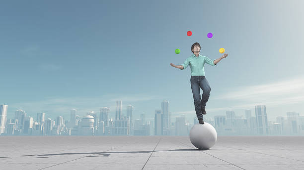 el hombre hace malabares con el balón en equilibrio - tightrope walking circus skill fotografías e imágenes de stock