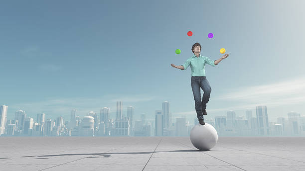 człowiek żongluje piłką w równowadze - tightrope walking circus skill zdjęcia i obrazy z banku zdjęć