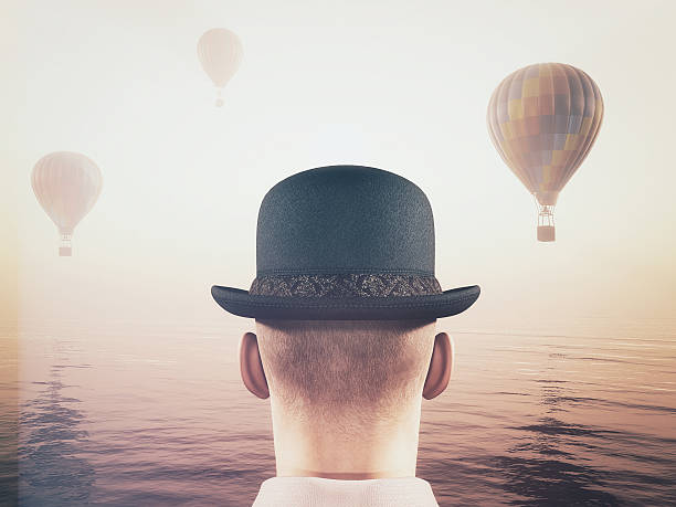 istock Man looks at hot air balloons 618190884