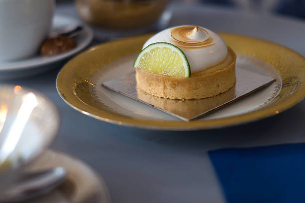 istock Cute meringue and lemon tartlet 618192182
