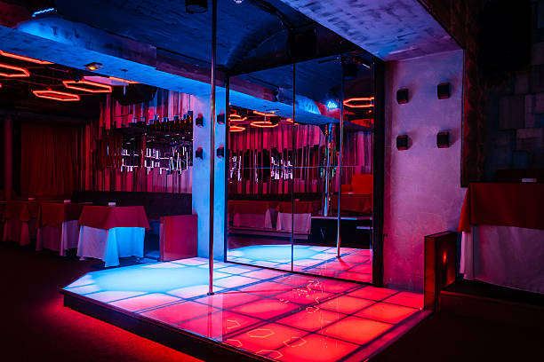 Night club interior with pole dance stage stock photo