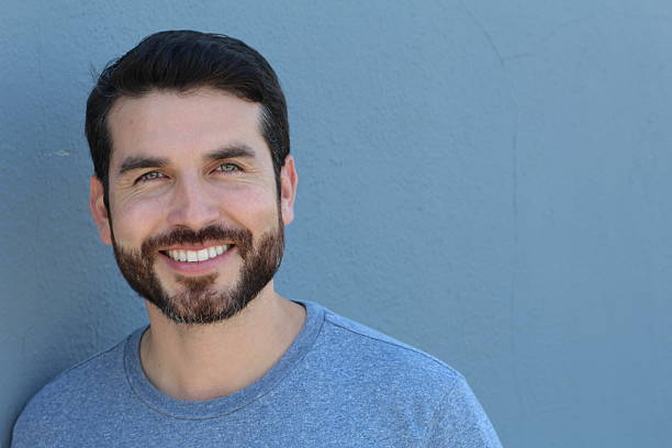 istock Happy stubble guy in blue, portrait 618197102