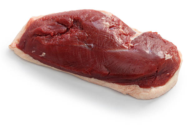 сырая утиная грудка изолирована на белом фоне - duck meat meat white meat food стоковые фото и изображения