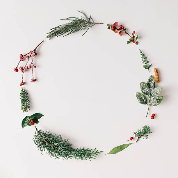 Christmas round frame made of natural winter things.