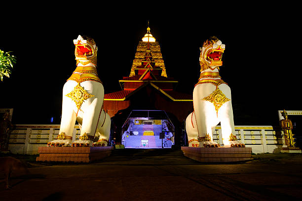 Kanchanaburi, Thailand - October 14, 2016: Night light ,Asean white lion statue at Chedi Buddhakhaya , is a symbol of Sangkhlaburi, .Photo taken on: October 14, 2016