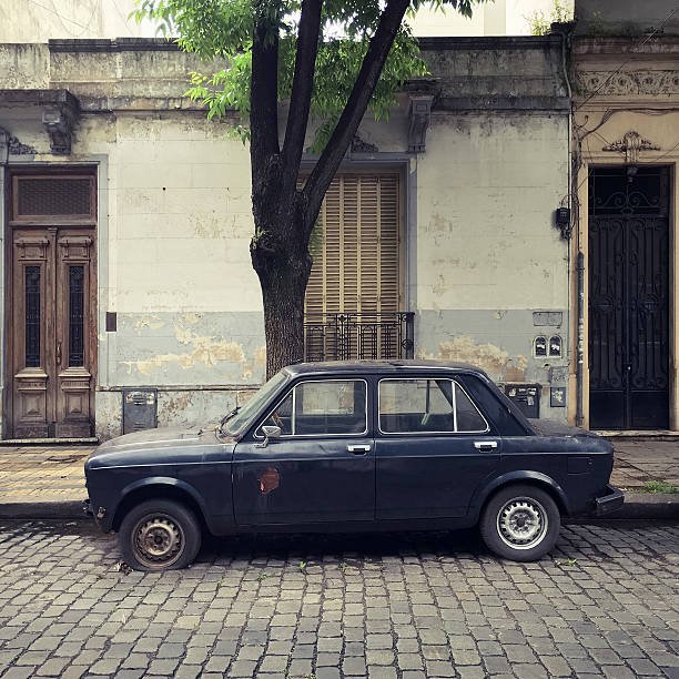 istock Old car parked in the street 618203984