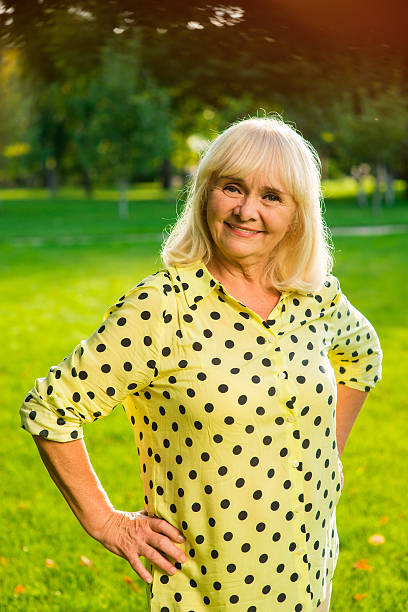 istock Smiling senior lady outdoors. 618206696