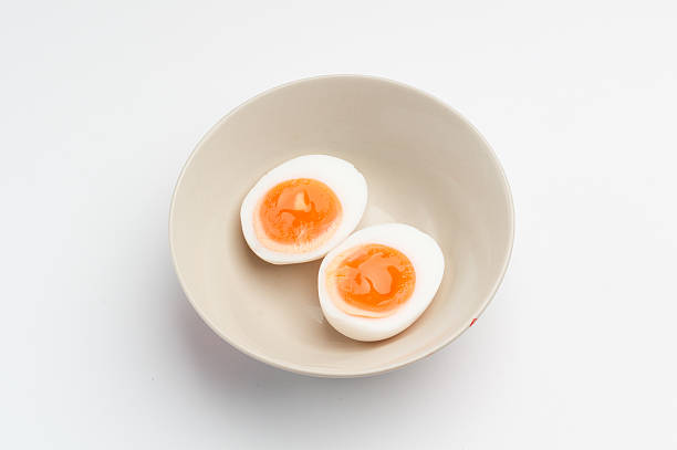 istock two halves of a boiled egg in a bowl 618208512