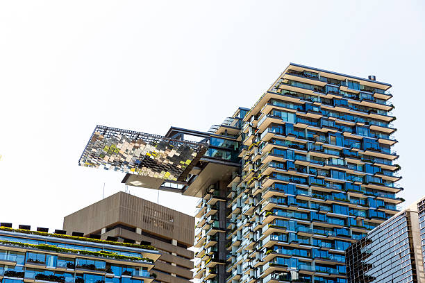 Modern apartment buildigs with heliostat, Sydney Australia, copy space Residential buildings with heliostat of motorised mirrors, Central park, Sydney Australia, full frame horizontal composition with copy space heliostat photos stock pictures, royalty-free photos & images