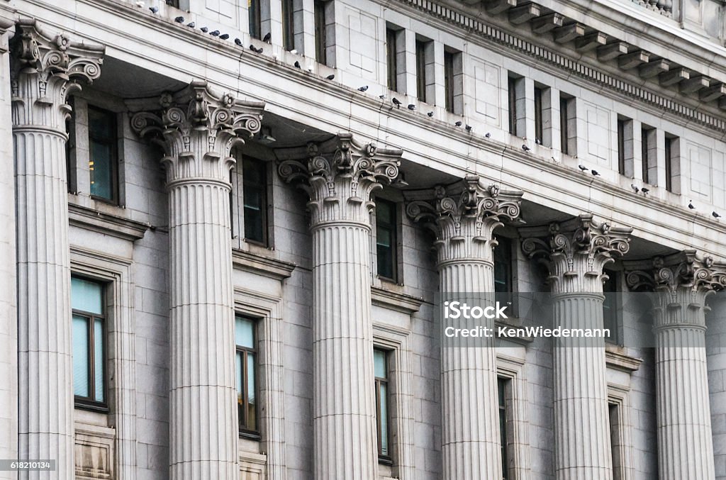 Corinthian Columns Stately set of Corinthian Columns on a building in Montreal, Canada Banking Stock Photo