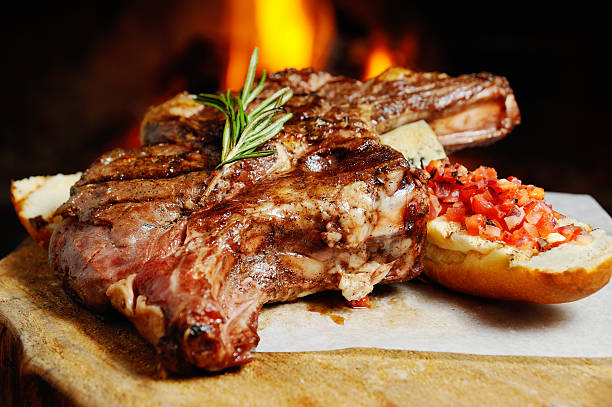 delicious piece of meat roasted on a background of fire