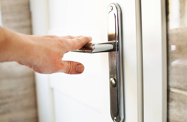 istock The process of clicking on the handle to open 618210612
