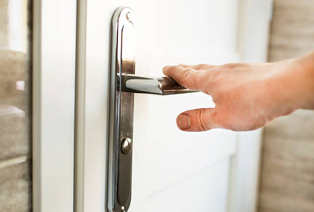 istock The process of clicking on the handle to open 618210660