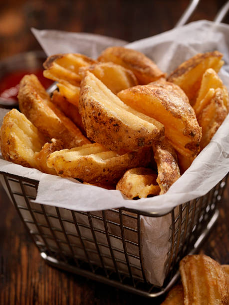 istock Basket of Wedge Fries 618213124