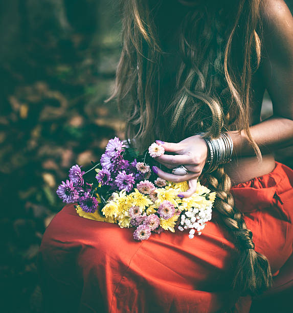 istock Beautiful woman with flowers 618213322