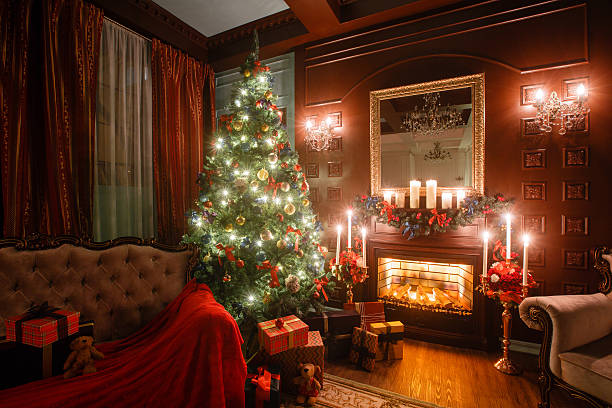 istock Christmas evening by candlelight. classic apartments with a white fireplace 618214562