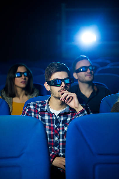 istock People at the cinema 618214932