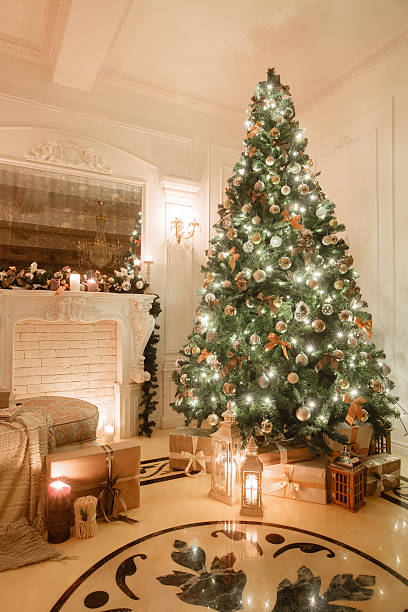 istock Christmas evening by candlelight. classic apartments with a white fireplace 618215374